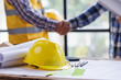 © David - Architect contractor shaking hands with client after seal a deal to renovate building, engineer handshake partnership and contractor concept