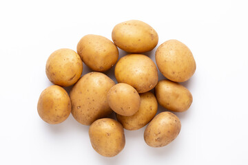 Wall Mural - Potatoes isolated on white background. Flat lay. Top view.