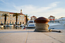 Iron Bollard For Mooring Of Ships At Pier. Landscape With Sea Wharf. Split, Croatia.