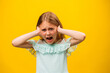 Leinwandbild Motiv Child anger. portrait of furious little girl kid screaming looking at camera