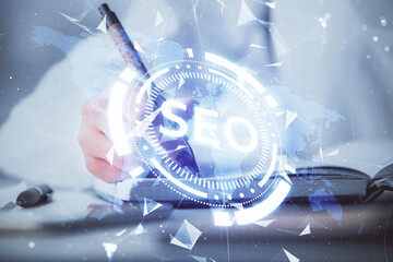 Aufkleber - Double exposure of woman's hands making notes with SEO icon. Concept of Search engine optimization