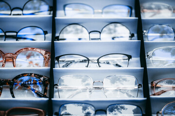 Shelf with glasses in the shop