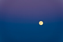 Full Moon Against Blue Sky