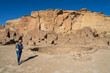 © Tetra Images - USA, New Mexico, Chaco Canyon, Tourist at Pueblo Bonito at Chaco Culture National Historical Park