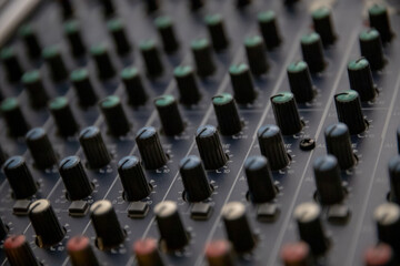 Closeup shot of a mixer with colored knobs