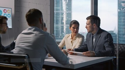 Wall Mural - Office meeting: mature business people negotiating the signing of contract