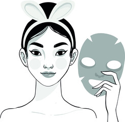 woman holding facial mask