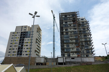 building in construction with crane new flats skycrapper