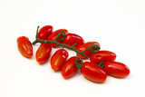 Fototapeta Kuchnia - Cherry tomatoes with a branch on a white background. Close-up