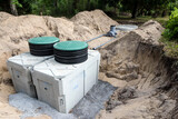 Fototapeta Sawanna - installation of a micro sewage treatment plant in a private home