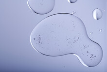 Blob With Bubbles And Clear Formulation On A Transparent Background. Clear Liquid With Bubbles Resembling Glycerin, Hyaluronic Acid Or Keratin In Laboratory Or Scientific Setting. 
