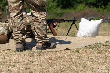 The Ukrainian military fires from a machine gun.