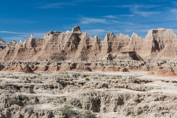 Sticker - Colorful hills and rock formations under a blue sky in Badlands National Park, SouthDakota,USA