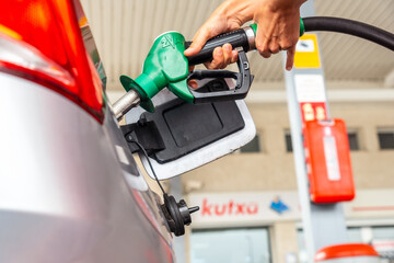 Refueling gasoline or diesel at the gas station in the fuel crisis due to high prices