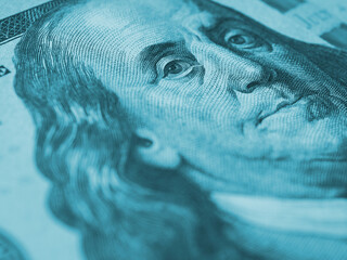 Wall Mural - american paper money. a $100 bill with focus on eyes of benjamin franklin. business economy and the 