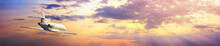 Modern Corporate Business Jet During Flight Against The Background Of The Sunset Sky. Horizontal Banner With Free Copy Space For Text