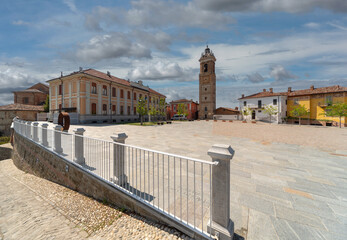 La Morra, Langhe, Italy- May 02, 2022: Piazza Castello with the bell tower and the school building named after 