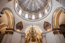 Round Ceiling In A Catholic Church With Painting