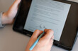 © Gonzalo - Female GP making electronic notes in tablet pc