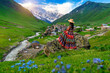 © tawatchai1990 - Tourist enjoy view of Ushguli village in Georgia.