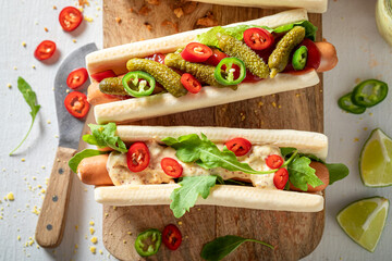 Wall Mural - Unhealthy and tasty hot dogs as appetizers for summer party.