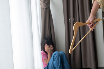 Wall Mural - mother hit her kid, children crying, feeling sad, young girl unhappy, family violence concept, selective focus and soft focus