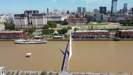 Wall Mural - Buenos Aires, Argentina: Aerial drone footage of Buenos Aires downtown district with the Casa Rosada, the Pink House, along the puerto madero harbor in Argentina capital. Shot with a tilt up motion