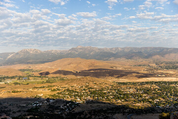 Burn scar from wildfire spanning 2 bridges across the landscape hwy 395 south of Reno, NV