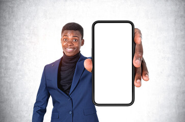 Poster - Black businessman show mockup display smartphone, grey background