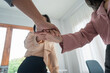 © Songsak C - Business teamwork join hands together. Business teamwork concept