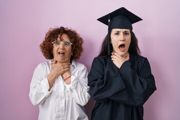 Sticker - Hispanic mother and daughter wearing graduation cap and ceremony robe shouting and suffocate because painful strangle. health problem. asphyxiate and suicide concept.