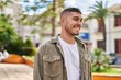 © Krakenimages.com - Young hispanic man smiling confident standing at park