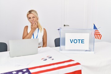 Sticker - Young caucasian woman at america political campaign election touching mouth with hand with painful expression because of toothache or dental illness on teeth. dentist concept.