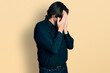 © Krakenimages.com - Middle age caucasian man wearing casual clothes and glasses with sad expression covering face with hands while crying. depression concept.