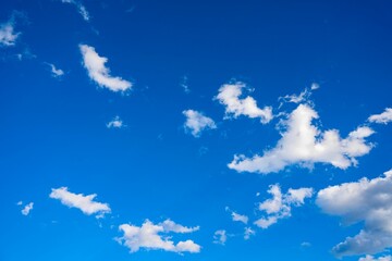 Blue sky background with white clouds