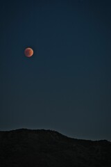 Canvas Print - Mysterious view of a night sky with red moon in Los Angeles, California, USA