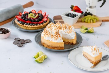 Poster - High angle of various delicious cakes on the white surface