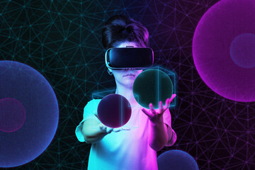 A young woman in virtual reality glasses creates spheres. Dark background with neon geometric shapes. The concept of 3D simulation, metaverse and futurism