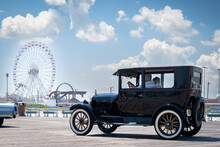 Ford Model T On Boardwalk With Ferris Wheel In Background