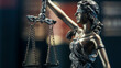 © sebra - Legal and law concept statue of Lady Justice on books background