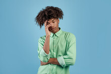 Portrait Of Bored Black Guy Leaning On Palm And Closing Eyes, Being Tired Of Something, Having Dull Day