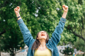 girl in the street screaming euphoric with joy