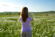 © andreymuravin - Girl in a chamomile field