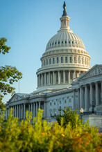 Partial View Of The United States Capitol Building On A Sunny Summer Day With Blue Sky