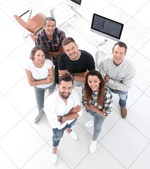 Sticker - young professionals standing near the desktop