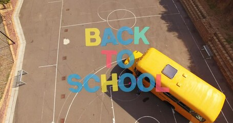 Canvas Print - Animation of back to school text over school bus and schoolchildren