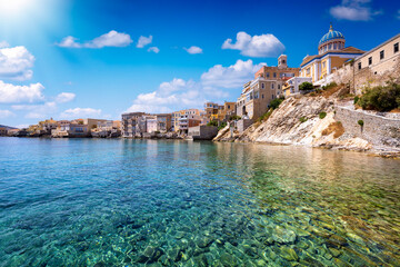 Wall Mural - the emerald sea at the vaporia district, city of ermoupoli at syros island, cyclades, greece, during