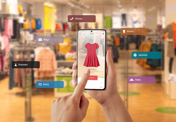 Wall Mural - buying clothes with virtual reality app on a smart phone. choosing the color and size of the dress