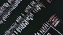 Aerial Top View Of Boats And Yachts Moored In Modern Marina.