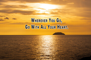 Wall Mural - Motivational quote on sunset beach - Wherever you go, go with all your heart.